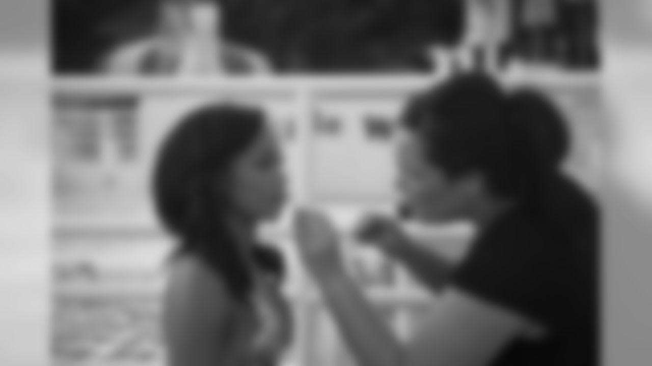 Brittiney W. gets her makeup touched up