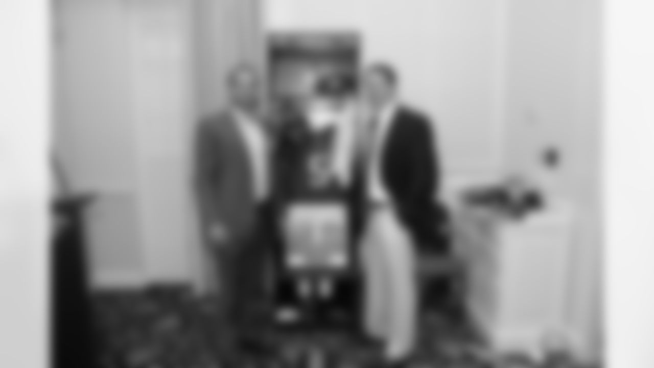Punter Matt Bosher and the CEO of Geogia United Healthcare, Rick Elliott