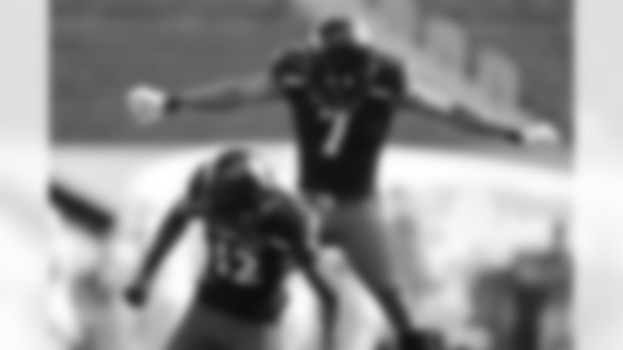 FILE - Cincinnati cornerback Ahmad Gardner (12) celebrates making an interception with teammate cornerback Coby Bryant (7) during an NCAA college football game against South Florida, on Oct. 3, 2020, in Cincinnati. Gardner is in line to become Cincinnati's first NFL first-round draft pick in 50 years. Opponents avoided throw his direction, and opposite corner Coby Bryant put up big enough numbers to win the Jim Thorpe Award. The dynamic duo faces their toughest test against Alabama. (AP Photo/Aaron Doster, File)
