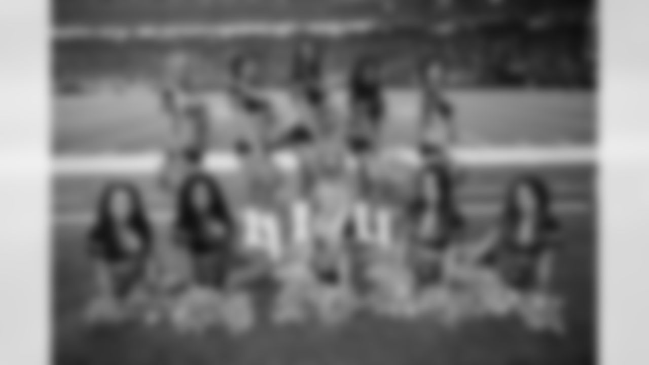 Many of the Atlanta Falcons Cheerleaders pose for a picture during Sunday Night Football