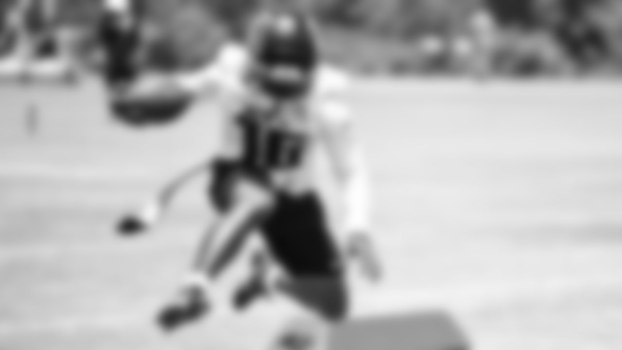 Atlanta Falcons wide receiver Greg Dortch #16 leaps during organized team activities in Phase III of the Atlanta Falcons offseason program on June 4, 2021.