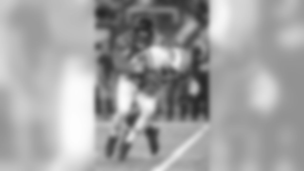 DT Corey Peters sacks QB Geno Smith