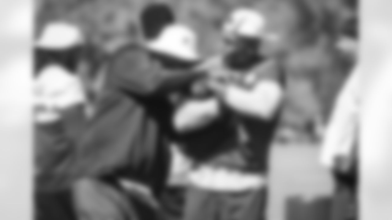 Coach hugs