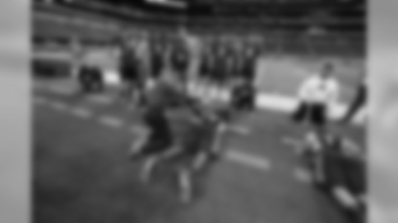 UCLA offensive lineman Caleb Benenoch is measured