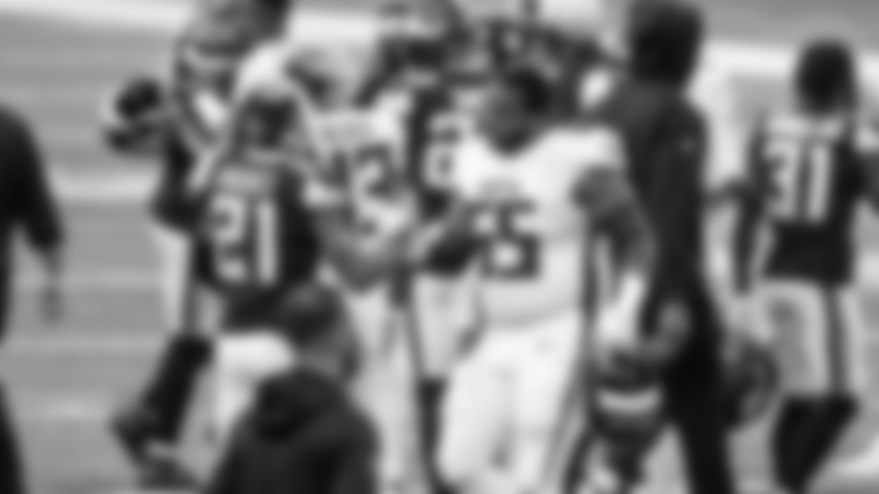 Atlanta Falcons defensive end Steven Means #55 and Minnesota Vikings cornerback Mike Hughes #21 are shown after the game on October 18, 2020. (Photo by Kyle Hess/Atlanta Falcons)
