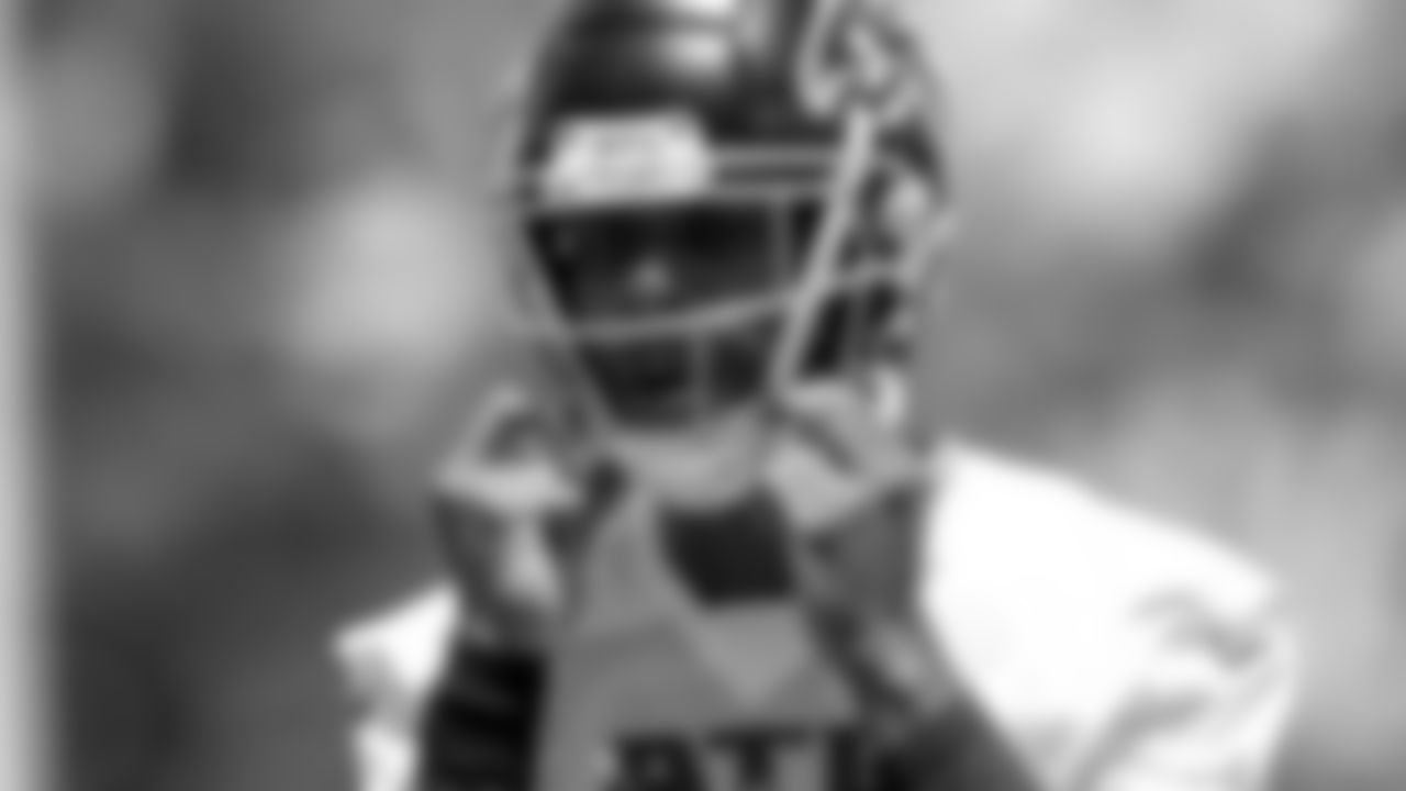 Atlanta Falcons tight end Kyle Pitts #8 adjusts his helmet during first practice of Atlanta Falcons rookie minicamp on May 14, 2021.