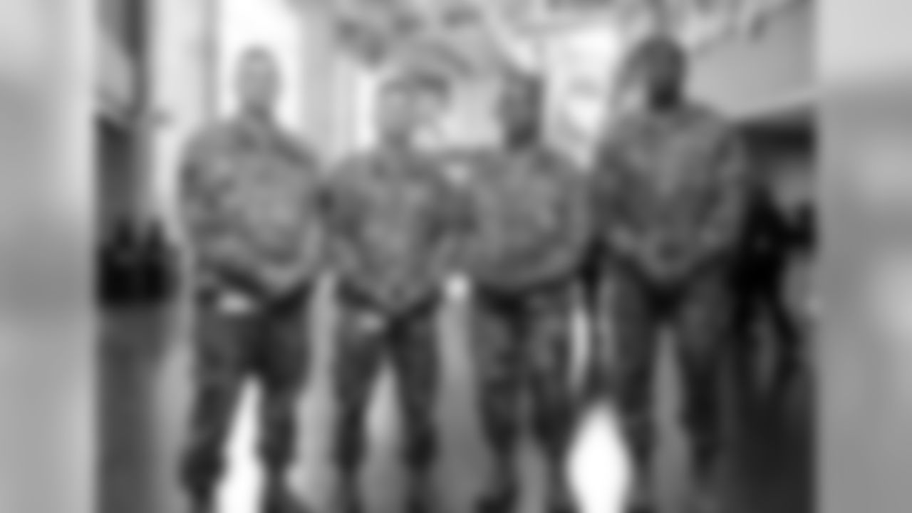 A group shot of U.S. Army soldiers before the game between the Atlanta Falcons and the Tampa Bay Buccaneers at Mercedes-Benz Stadium in Atlanta, GA, on Sunday November 24, 2019. (Photo by AJ Reynolds/Atlanta Falcons)