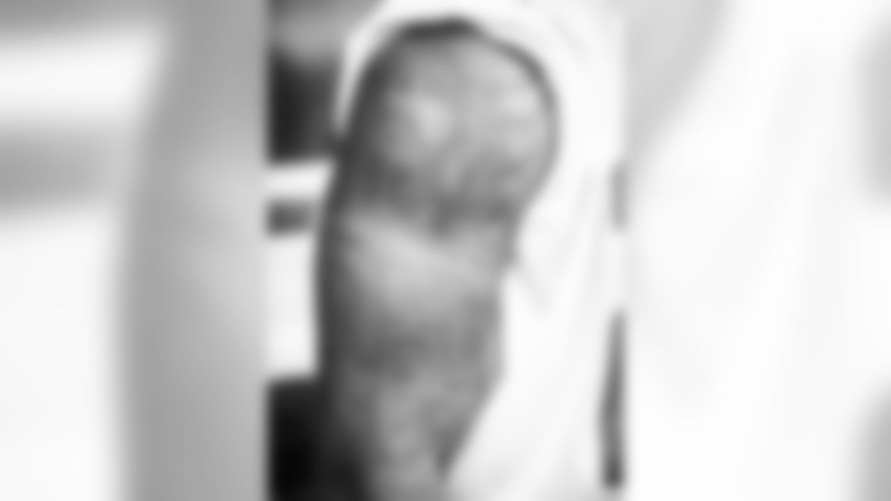 If you know what to look for, you can learn a good bit about RB Devonta Freeman just by looking at him. Freeman is a man of faith and says the story behind one of his most meaningful tattoos is "God over Everything." Freeman says he has been in, "critical situations and moments when nobody but God could've saved me...No one is more powerful than Him." The tattoo includes a protection scripture on his right bicep.