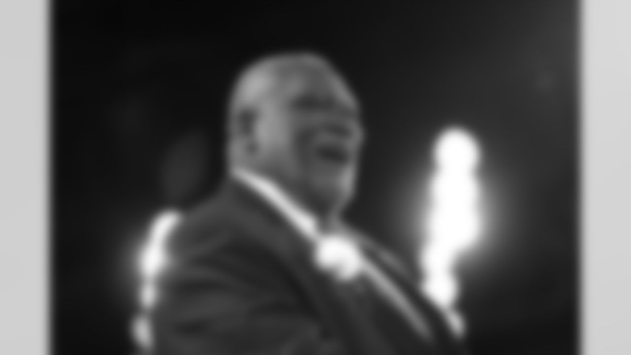 Claude Humphrey receives his gold jacket during the 2014 Pro Football Hall of Fame jacket ceremony in Canton, Ohio on Friday