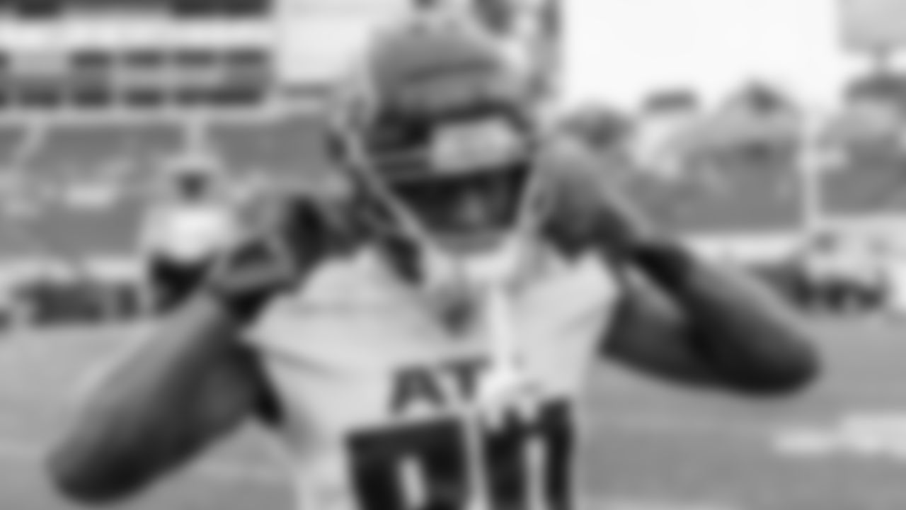 Atlanta Falcons wide receiver Laquon Treadwell #80 puts on his helmet before the game against the Tampa Bay Buccaneers on January 3, 2021.