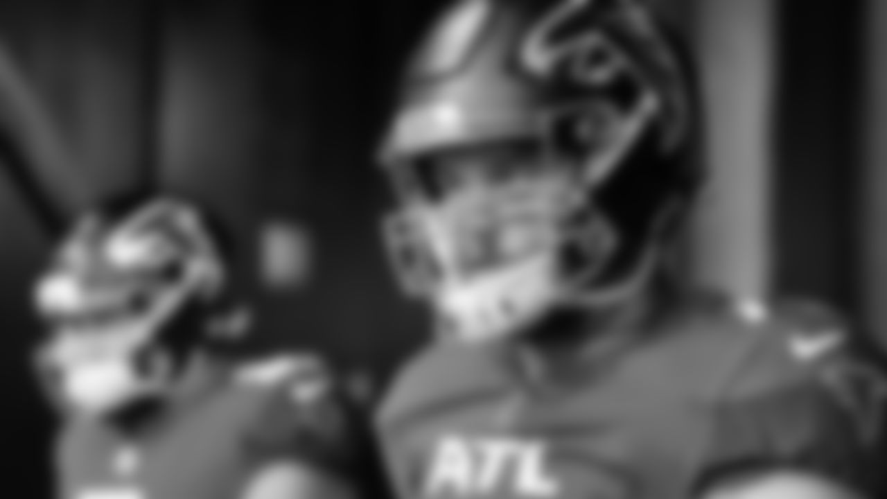 Atlanta Falcons offensive lineman Jake Matthews #70 walks out onto the field for warmups before the game against the Chicago Bears at Mercedes-Benz Stadium in Atlanta, Georgia on Sunday, November 20, 2022. (Photo by Mitchell Martin/Atlanta Falcons)