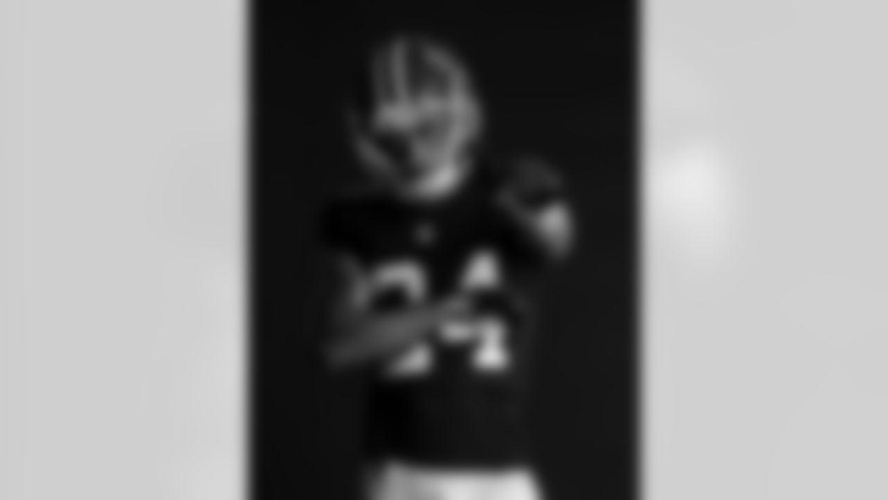 AJ Terrell poses for a portrait during the Red Helmet shoot at Mercedes-Benz Stadium in Atlanta, Georgia on Friday, May 17, 2022. (Photo by Brandon Magnus/Atlanta Falcons)