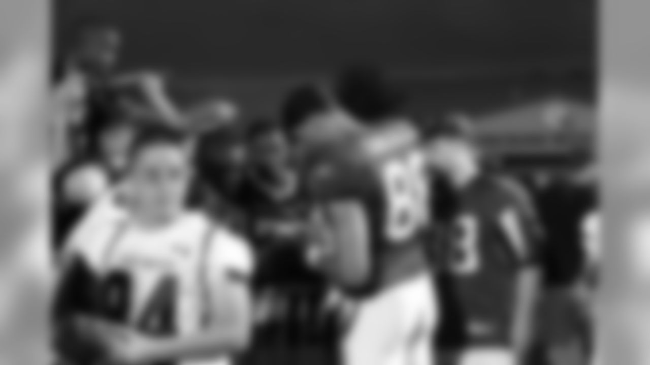 Tony Gonzalez signs for fans // 2011 Friday Night Lights // August 5, 2011 // Norcross, Ga. —