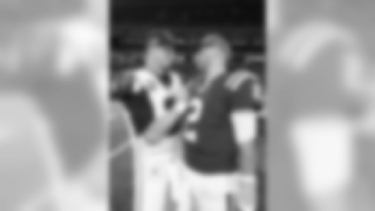 Atlanta Falcons quarterback Matt Ryan #2 and Indianapolis Colts quarterback Brian Hoyer #2 meet after the game at Lucas Oil Stadium in Indianapolis, Indiana, on Sunday September 22, 2019. (Photo by Lauren Bacho/Atlanta Falcons)