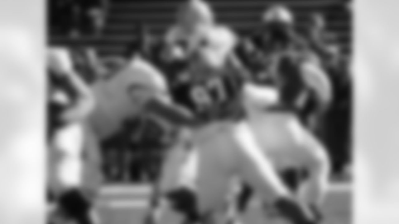 Pitt DT Aaron Donald (97) gets around Utah State's Tyler Larsen for the pressure