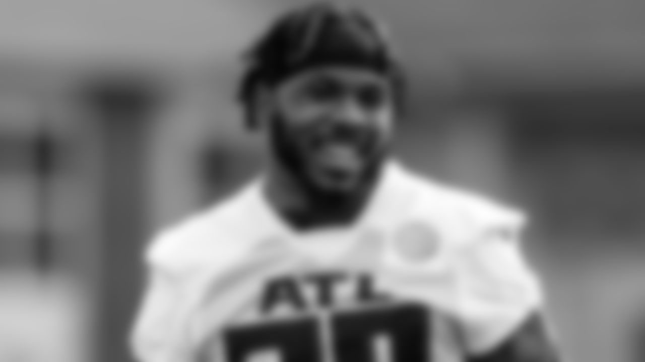 Atlanta Falcons running back Qadree Ollison #30 smiles during field work drills in Phase II of the Atlanta Falcons offseason program on May 18, 2021.