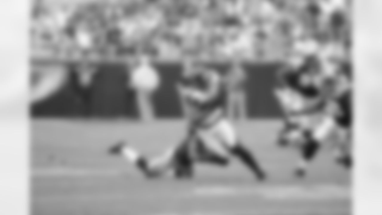 WR Roddy White gets past two Carolina defenders