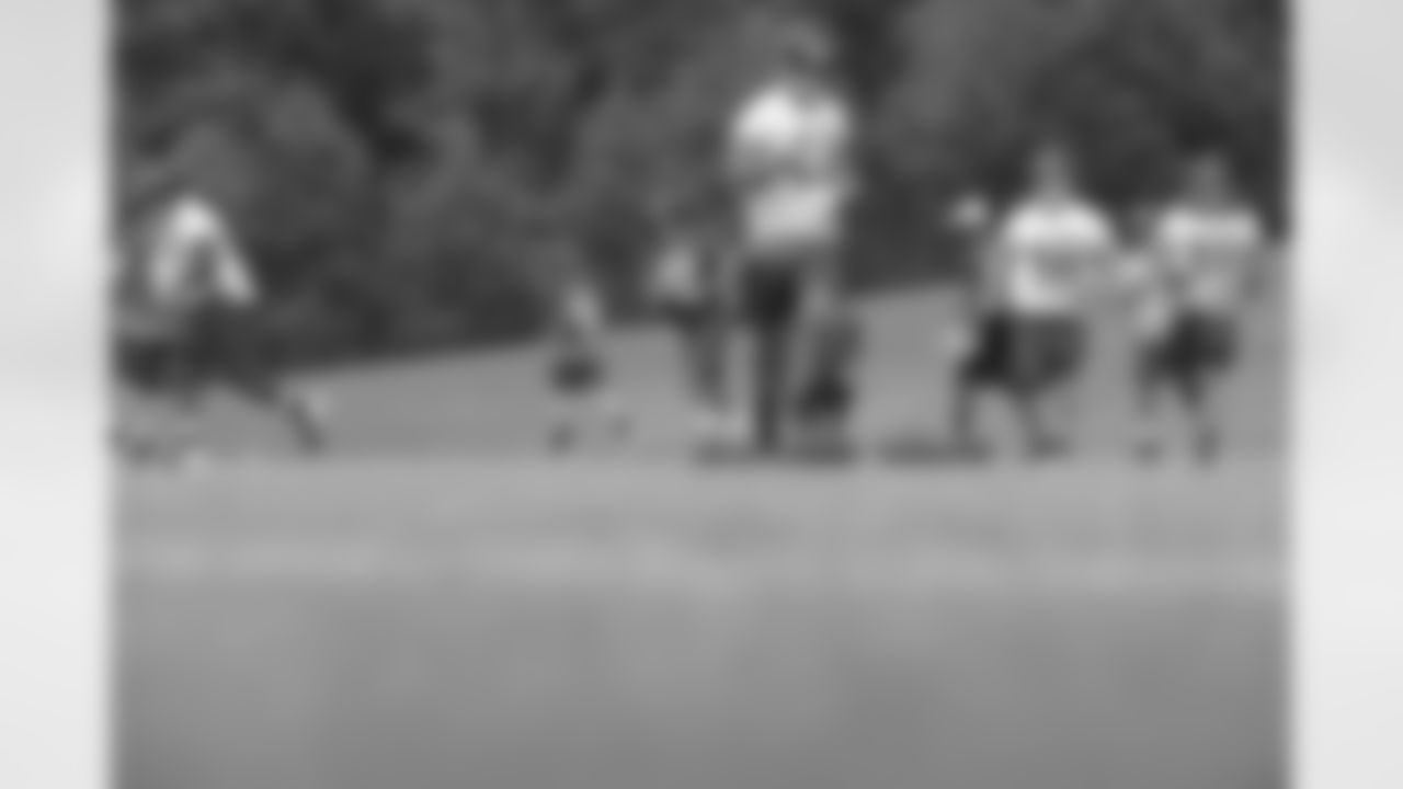 Players run off to the next drill // 2012 Rookie Minicamp – Day 2 // May 12, 2012 // Flowery Branch –