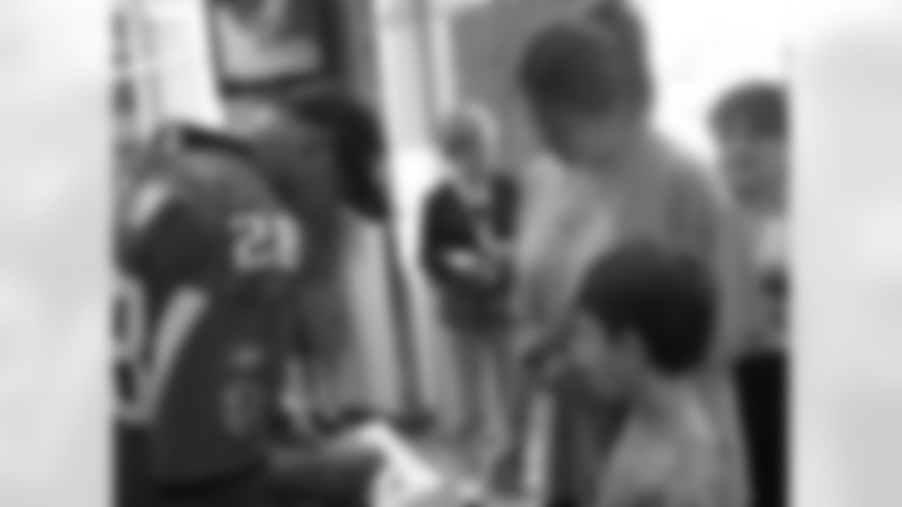 The Atlanta Falcons visit CHOA // Thomas DeCoud signing autographs for some patients // Atlanta, GA //
