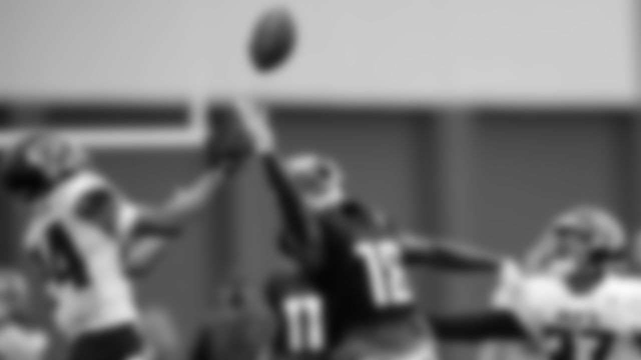Atlanta Falcons wide receiver Calvin Ridley #18 reaches for the ball as he is defended by cornerback AJ Terrell #24 and strong safety Damontae Kazee #27 at AT&T Atlanta Falcons Training Camp on August 24, 2020 in Flowery Branch, GA. (Photo by Rob Foldy/Atlanta Falcons)