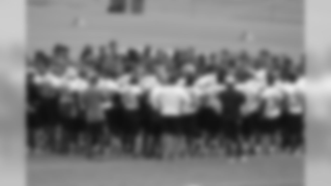 The team huddles after practice // 2011 Russell Athletic Training Camp - Day 1 // July 29, 2011 // Flowery Branch, Ga. —
