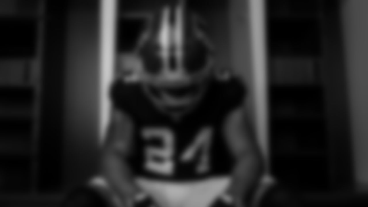 AJ Terrell poses for a portrait during the Red Helmet shoot at Mercedes-Benz Stadium in Atlanta, Georgia on Friday, May 17, 2022. (Photo by Brandon Magnus/Atlanta Falcons)