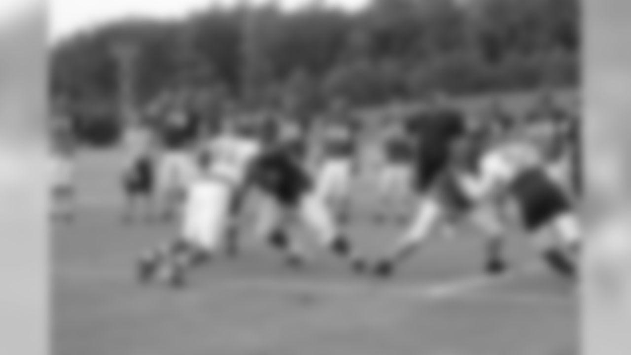 The offensive and defensive line work a drill // 2011 Russell Athletic Training Camp - Day 6 // August 2, 2011 // Flowery Branch, Ga. —