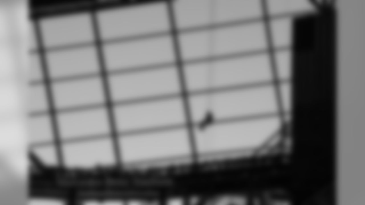 Rappelers repel from the rafters of Mercedes-Benz Stadium before the game between the Atlanta Falcons and the Tampa Bay Buccaneers in Atlanta, GA, on Sunday November 24, 2019. (Photo by Rob Foldy/Atlanta Falcons)