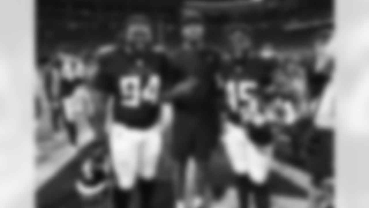 Atlanta Falcons defensive lineman Albert Huggins #94 and linebacker Mike Jones Jr. #45 after the Preseason Game against the Cincinnati Bengals at Mercedes-Benz Stadium in Atlanta, Georgia on Friday, August 18, 2023. (Photo by Jay Bendlin/Atlanta Falcons)