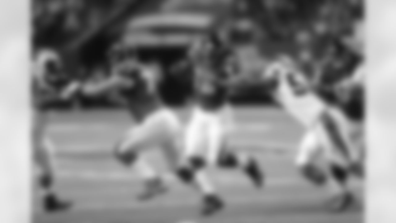 RB Steven Jackson throws the stiff arm