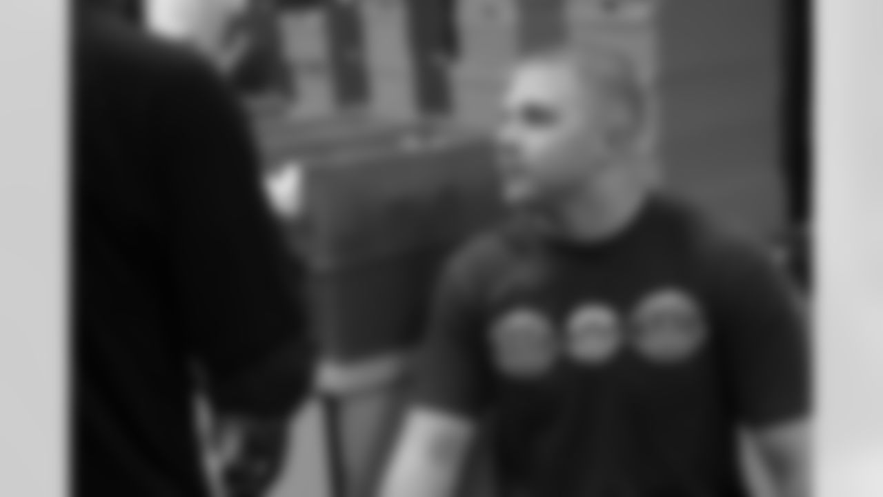 Fullback Bradie Ewing chats with the equipment staff // 2012 Rookies Report // May 10, 2012 // Flowery Branch -
