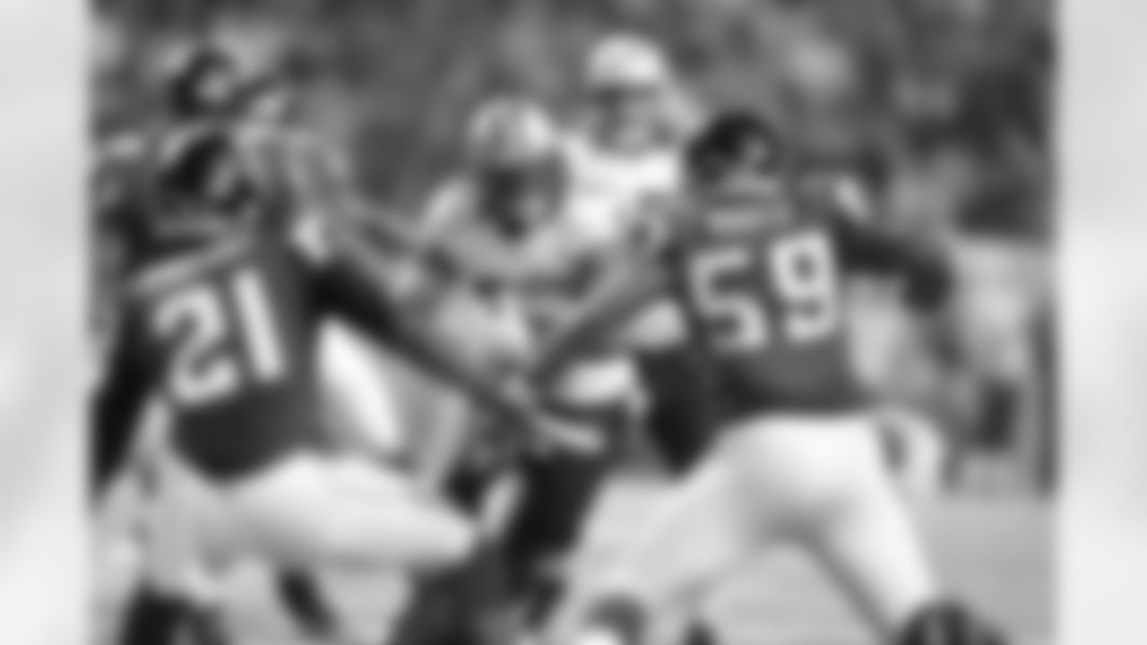 CB Desmond Trufant and LB Joplo Bartu brace for impact with Saints RB Mark Ingram