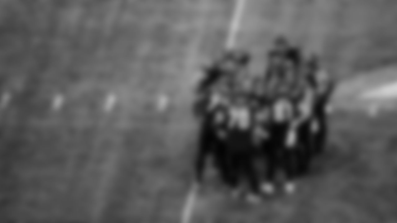 The Atlanta Falcons offense huddles on the field during the first quarter of the game against the Carolina Panthers on October 11, 2020. (Photo by Dakota Williams/Atlanta Falcons)