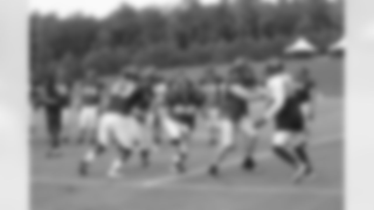 The offensive and defensive line work a drill // 2011 Russell Athletic Training Camp - Day 6 // August 2, 2011 // Flowery Branch, Ga. —