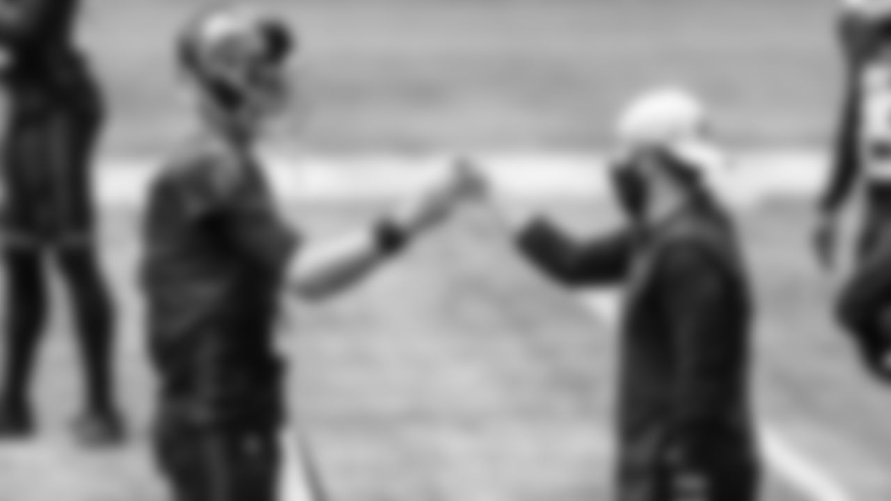 Atlanta Falcons quarterback Matt Ryan #2 fist bumps Atlanta Falcons coach coach Mayur Chaudhari during warm ups before the game against the Detroit Lions on October 25, 2020. (Photo by AJ Reynolds/Atlanta Falcons)