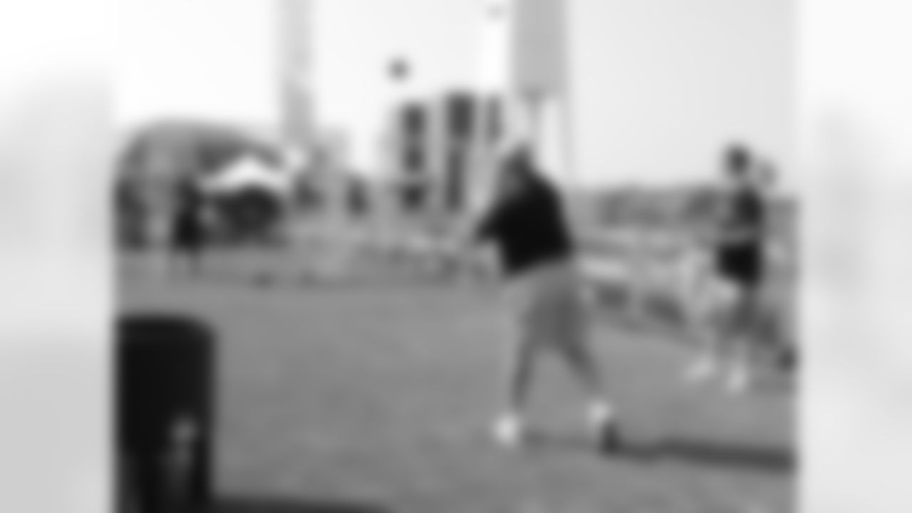 A fan shows off his throwing skills at Falcons Landing // Falcons vs. Cardinals // 9/19/10 - Georgia Dome