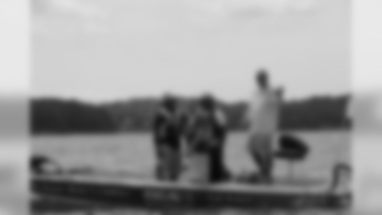 Atlanta Falcons players, coaches and cheerleaders spent Tuesday with wounded veterans during the fifth annual Fishing with the Falcons event on Lake Lanier // Fishing with the Falcons - 2012 // June 12, 2012 // Buford, Ga. -