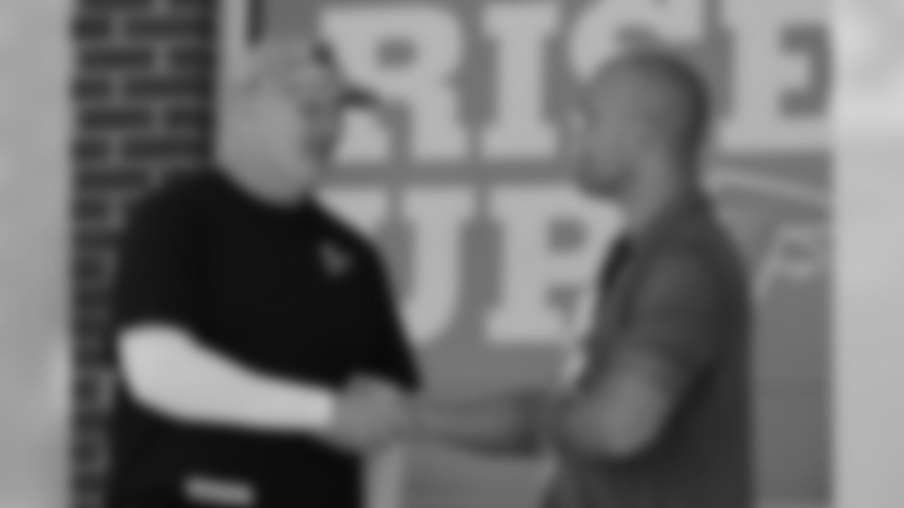 Head coach Dan Quinn and Robbie Lawler