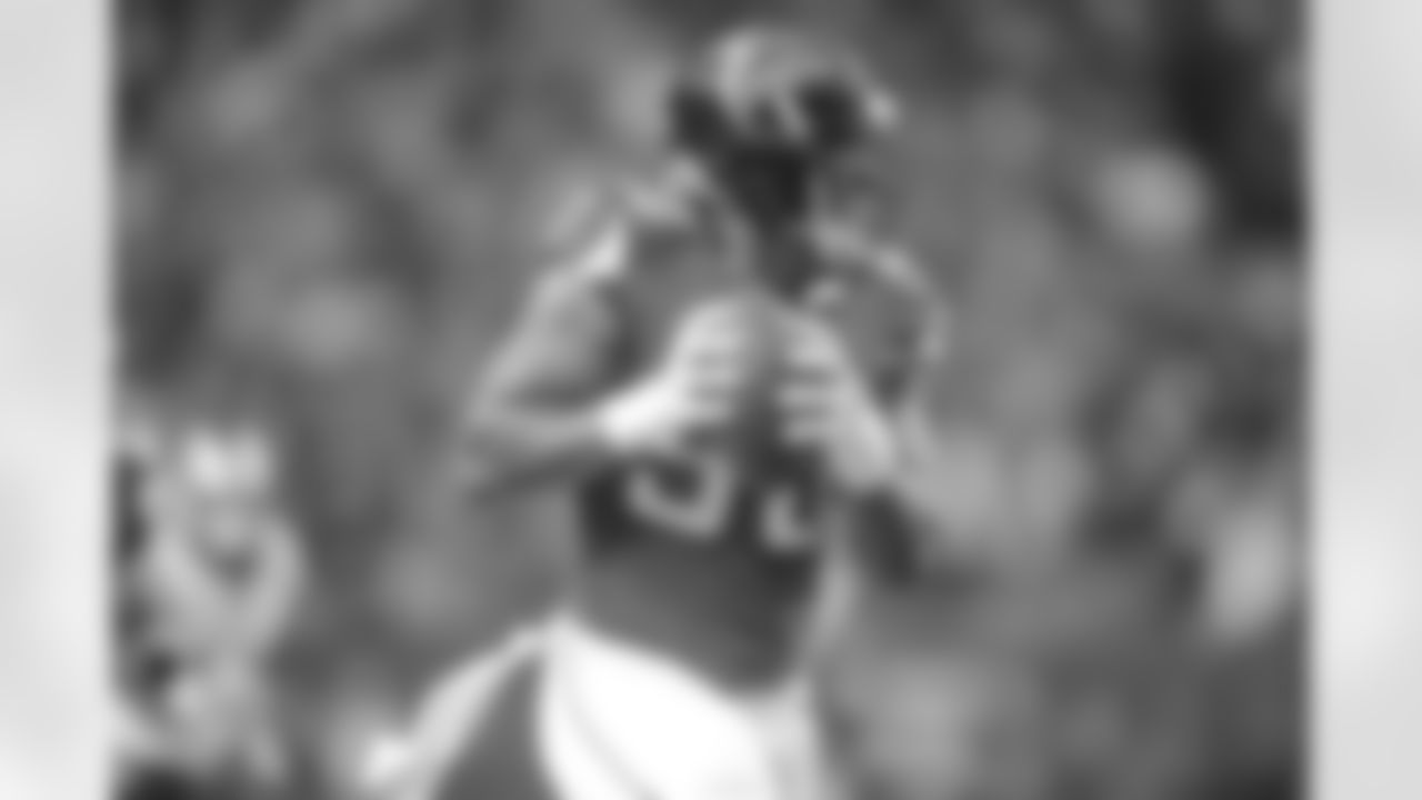 Down the field with his first interception goes DE Osi Umenyiora