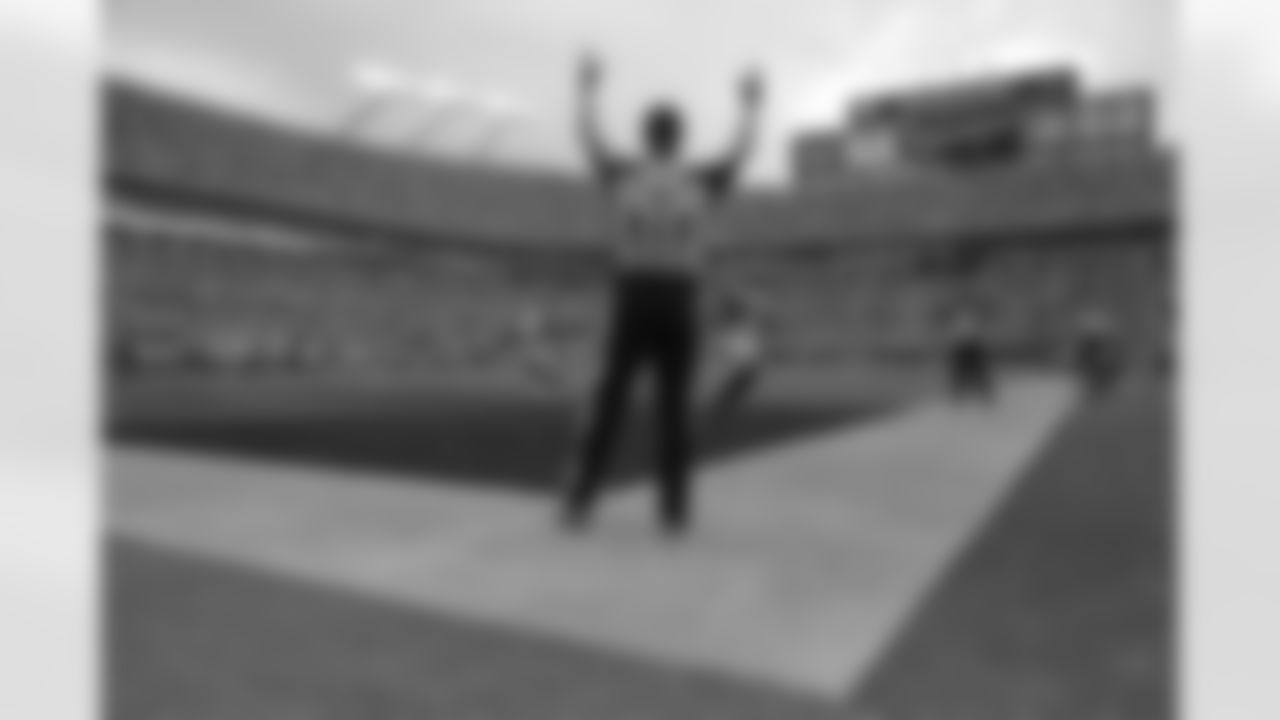 The referee signals touchdown after WR Roddy White makes the catch