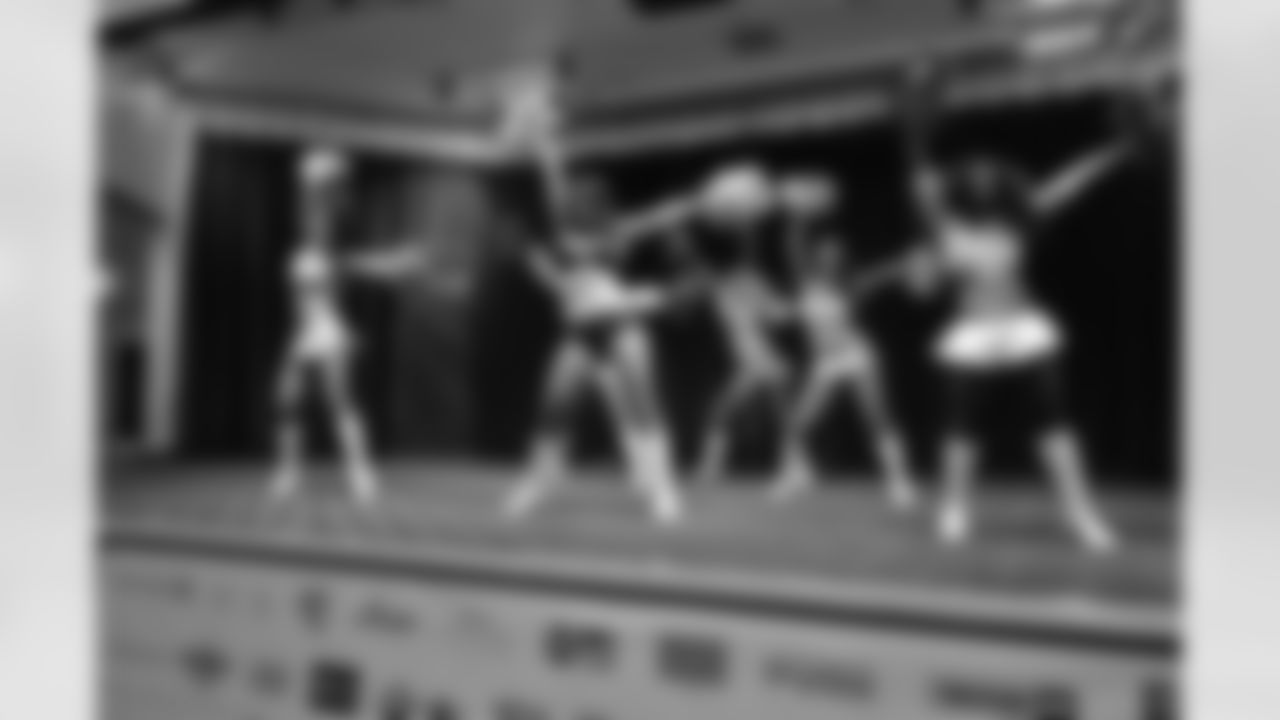 Alice F. and other NFL Cheerleaders perform at a military base in Japan