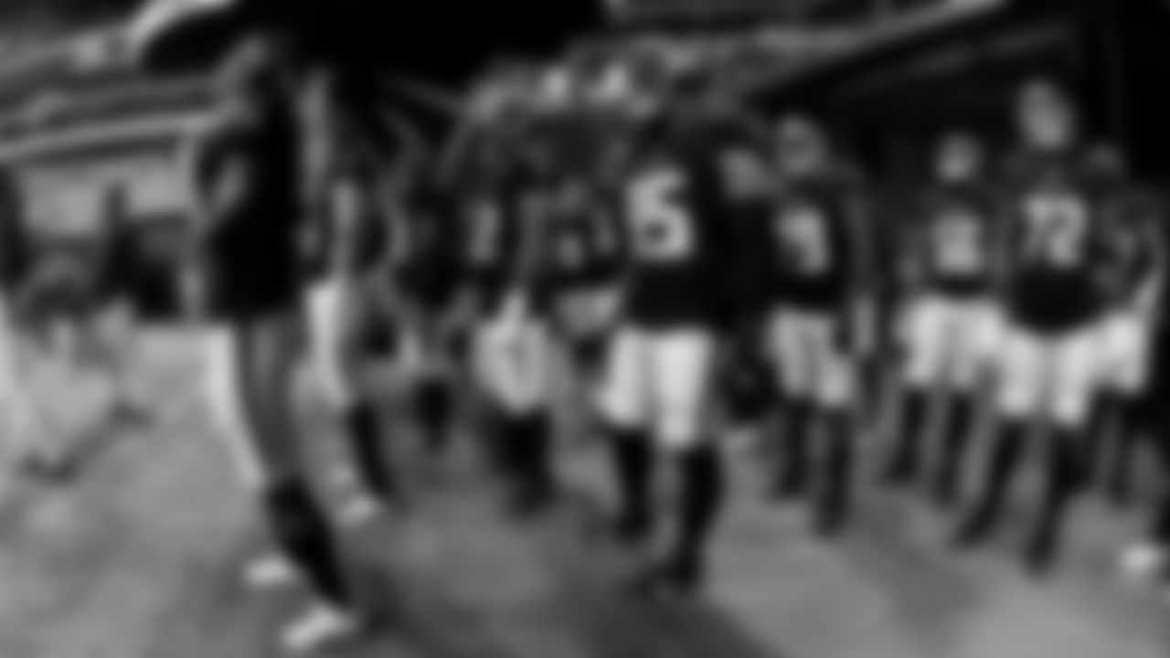 Atlanta Falcon players walk out for warm-ups before their pre-season game against the Tennessee Titans at Mercedes-Benz Stadium in Atlanta, Georgia on Friday, August 13, 2021. (Photo by Brandon Magnus/Atlanta Falcons)