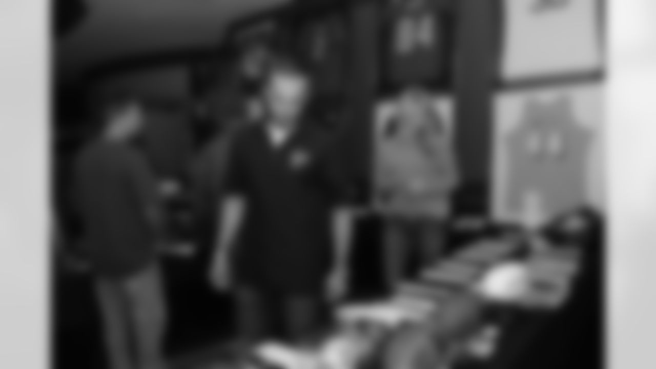 Punter Matt Bosher checks out the silent auction benefiting Children's Healthcare of Atlanta