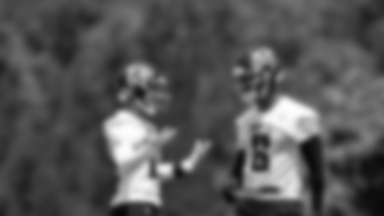 Atlanta Falcons wide receiver Juwan Green #19 talks with tight end Kyle Pitts #8 during the first practice of Atlanta Falcons rookie minicamp on May 14, 2021.