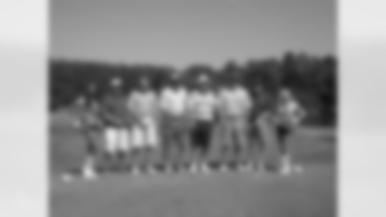 Offensive line coach Pat Hill poses with his group on the 17th tee, along with Head Coach Mike Smith // Verizon Wireless Network of Champions Golf Tournament - 2012 // June 18, 2012 // Suwanee, Ga., -