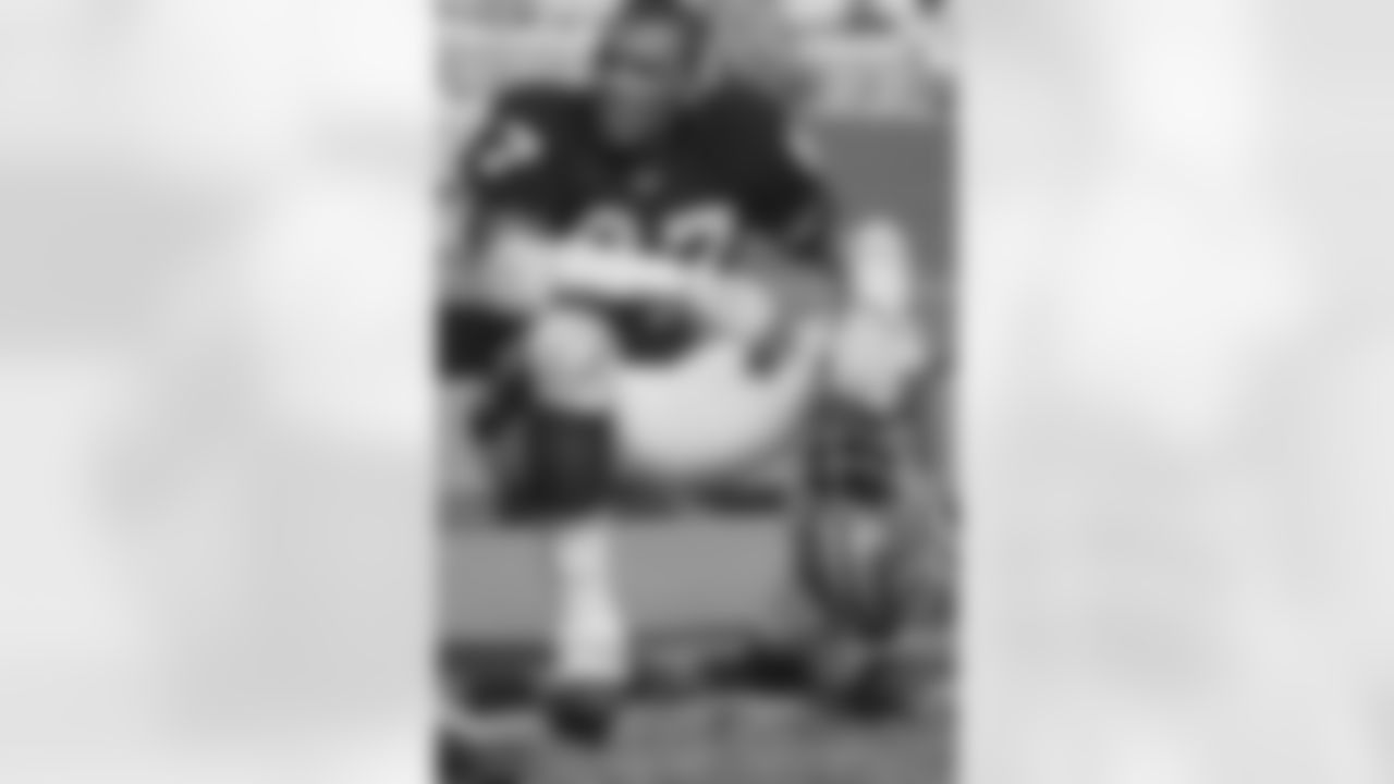 Claude Humphrey watches from the bench on October 20, 1968