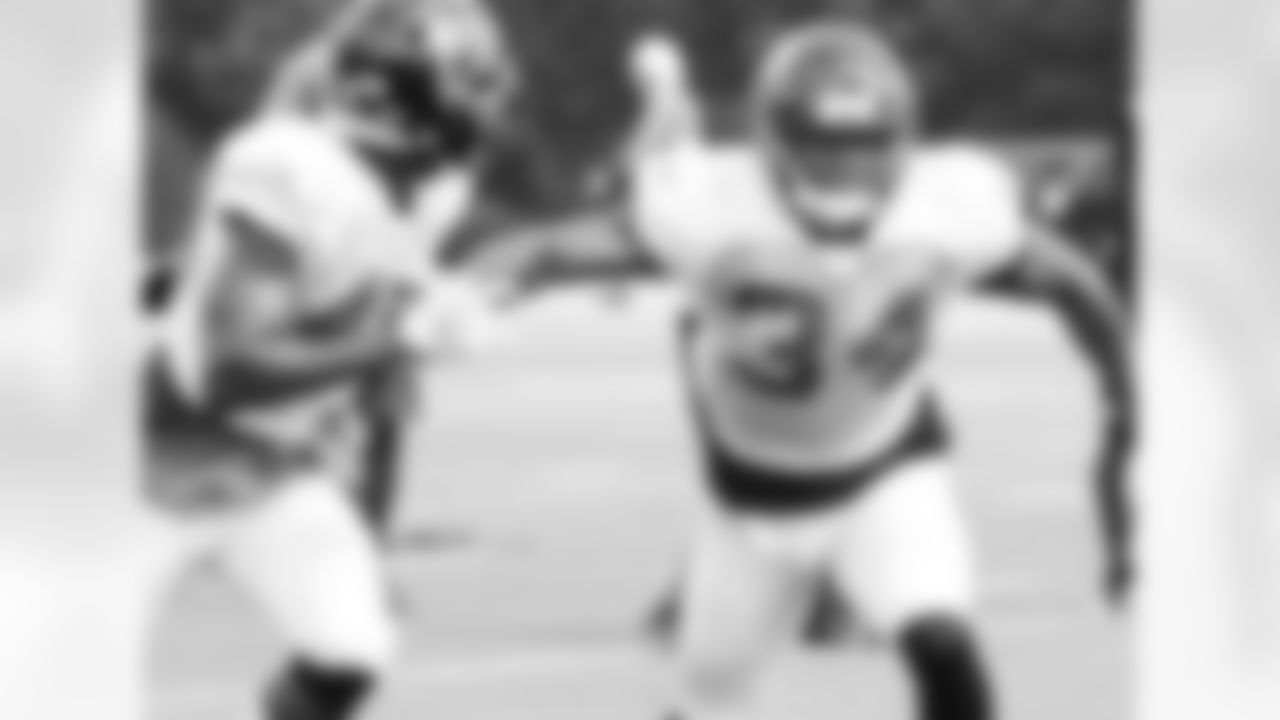 S Brian Poole makes a run down field