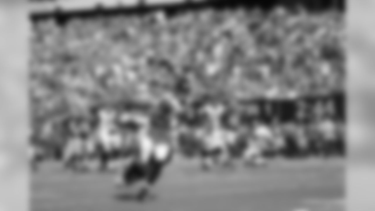 WR Julio Jones attempts to run through a tackle.
