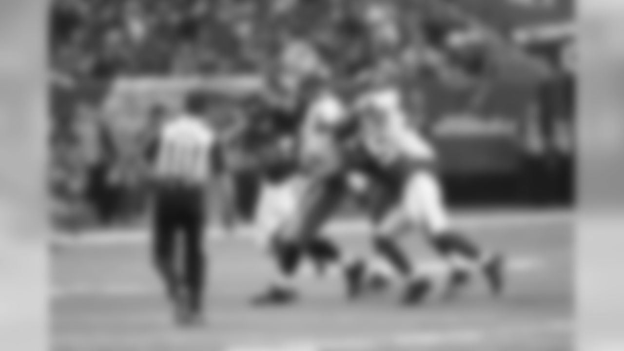 DE Stansly Maponga and DE Osi Umenyiora put pressure on Buccaneers QB Mike Glennon