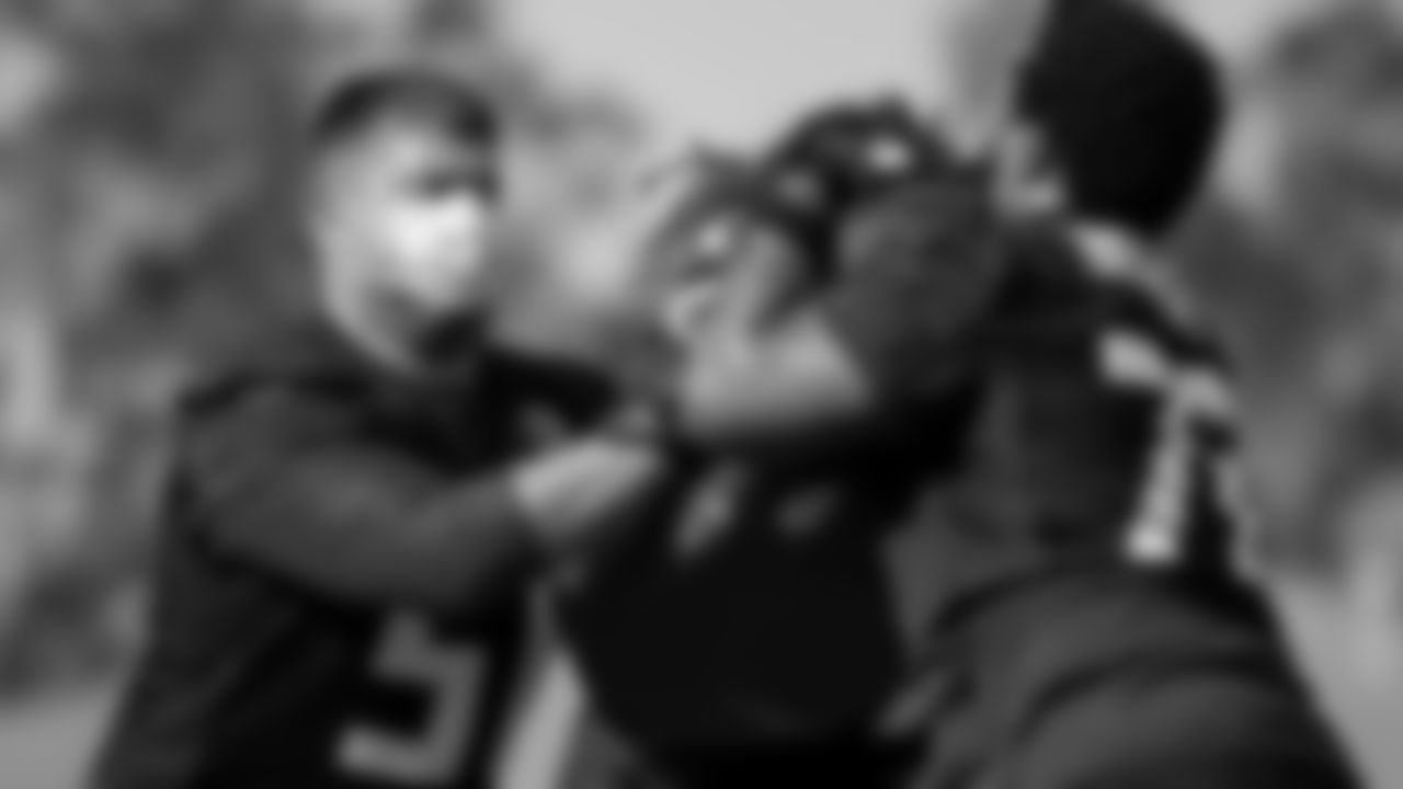 Atlanta Falcons center Alex Mack #51 works with offensive guard Willie Beavers #72 during practice at IBM Performance Field.